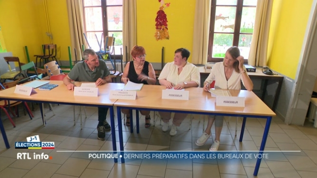 Derniers préparatifs dans les bureaux de vote, comme ici à Cour-sur-Heure
