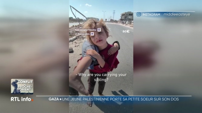 Images poignantes d'une fillette portant sa petite soeur à bout de bras dans Gaza