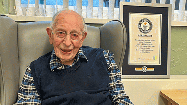 john-with-his-certificate