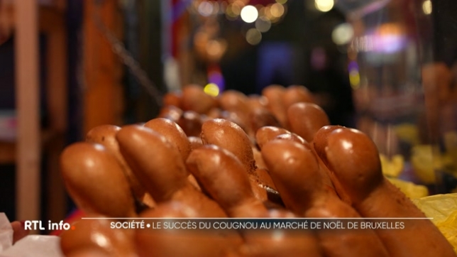 Le cougnou n'a pas toujours eu cette forme d'enfant Jésus mais plutôt de losange, rappelant la forme d'un berceau. Dégustée entre la Saint-Nicolas et Noël, la brioche rappelle des souvenirs d'enfance à tous les visiteurs rencontrés dans les allées du marché de Noël de Bruxelles.
