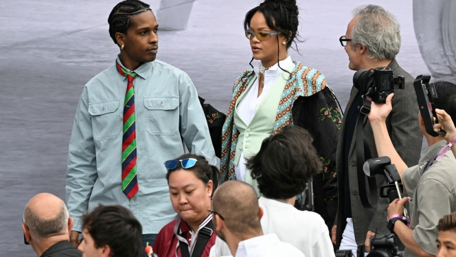 US actor. singer Asap Rocky (C-L) and Barbadian singer and actress Rihanna (C-R) arrive for Dior Homme's Menswear Ready-to-wear Spring-Summer 2026 collection fashion show as part of the Paris Fashion Week in Paris, on June 27, 2025. (Photo by EMMA DA SILVA / AFP) she expected long hours, she