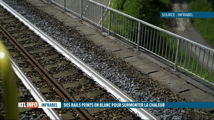 Pourquoi Infrabel peint les rails de chemin de fer en blanc? La réponse en vidéo