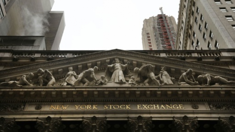 Wall Street commence d'un bon pied une semaine chargée en résultats d'entreprises