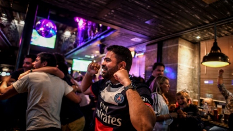 C1: rares mais heureux, les supporters du PSG jubilent à Lisbonne