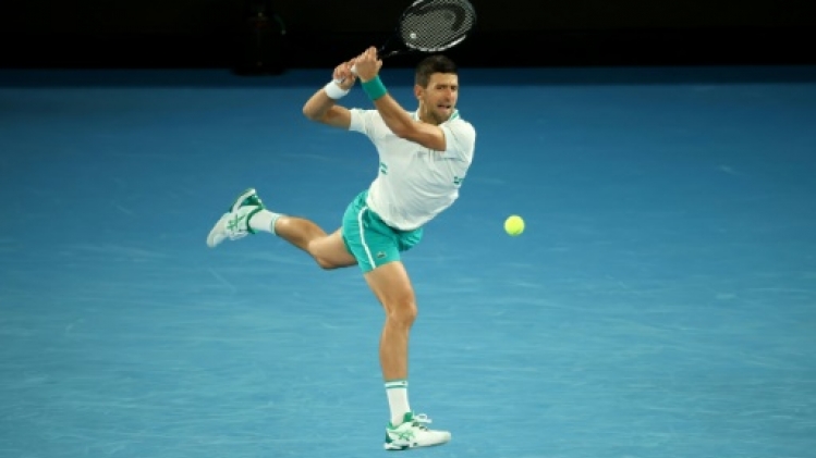 Open d'Australie: Djokovic domine la douleur et bat Raonic