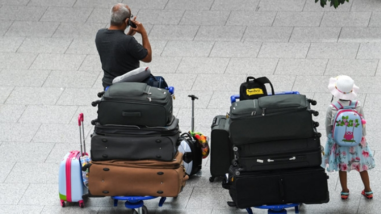 aeroport-voyageurs-bagages