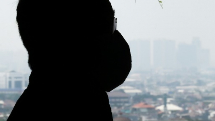 Des habitants de Jakarta à bout de souffle face à la pollution de l'air