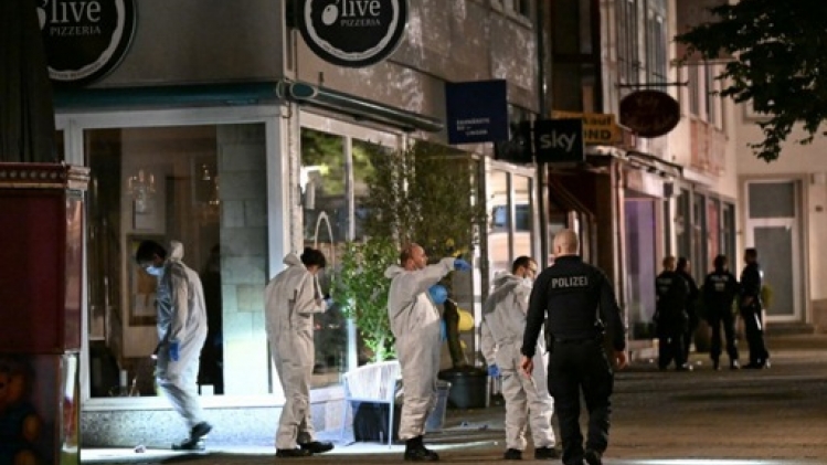 Allemagne: la ministre de l'Intérieur bouleversée par l'attaque, l'auteur reste en fuite