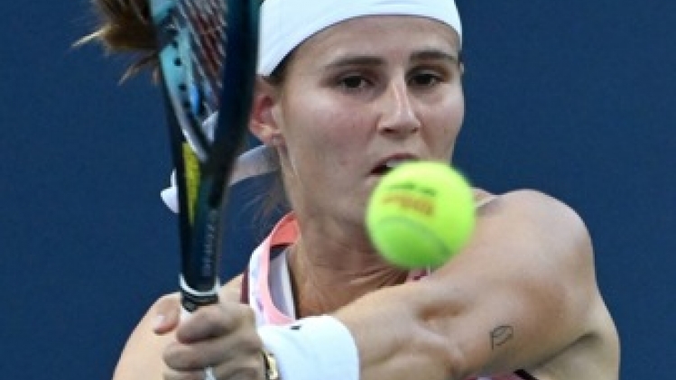 Greet Minnen passe le premier tour