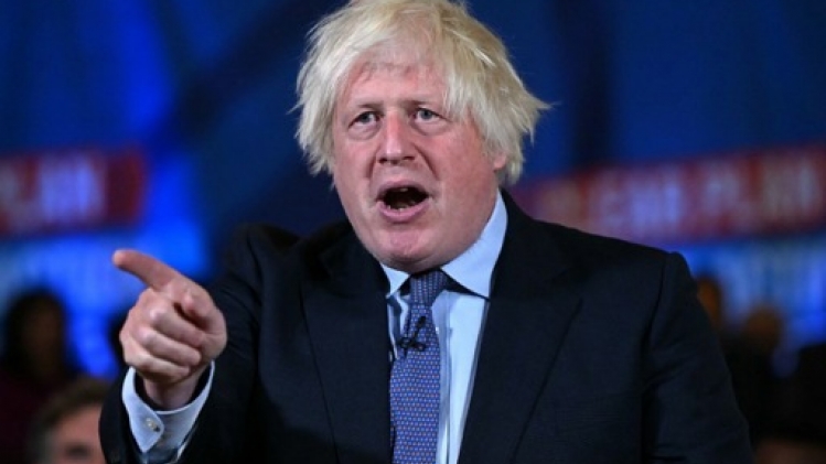 Dans ses mémoires, Boris Johnson règle ses comptes avec Emmanuel Macron