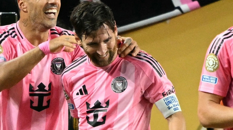 Inter Miami's Uruguayan forward #09 Luis Suarez (2nd L) celebrates with Inter Miami's Argentine forward #10 Lionel Messi (2nd R) and teammates after scoring his team's second goal during the FIFA Club World Cup 2025 Group A football match between US Inter Miami and Brazil's Palmeiras at the Hard Rock stadium in Miami on June 23, 2025. (Photo by CHANDAN KHANNA / AFP)
