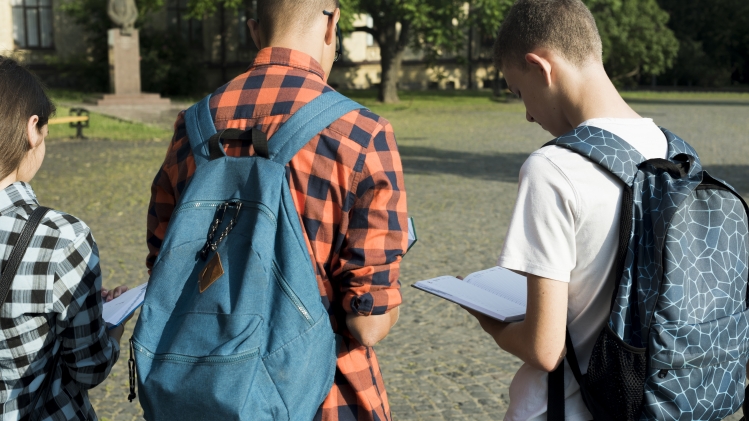 medium-shot-back-view-highschool-students-reading.jpg