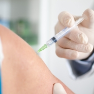 Doctor making an injection to a patient