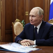 In this pool photograph distributed by the Russian state agency Sputnik, Russia's President Vladimir Putin meets with Governor of the Yamalo-Nenets Region in Moscow on October 28, 2025. (Photo by Alexander Kazakov / POOL / AFP)