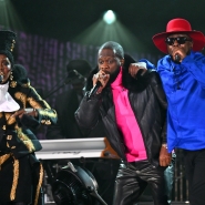 Les membres des Fugees, Lauryn Hill (gauche), Pras Michel (centre) et Wyclef Jean (droite).