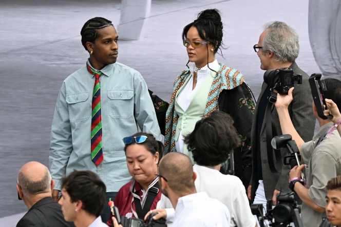 US actor and singer Asap Rocky (C-L) and Barbadian singer and actress Rihanna (C-R) arrive for Dior Homme's Menswear Ready-to-wear Spring-Summer 2026 collection fashion show as part of the Paris Fashion Week in Paris, on June 27, 2025. (Photo by EMMA DA SILVA / AFP)