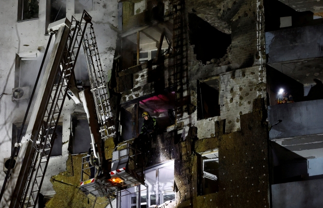 2026-01-09T043937Z_1903361806_RC2AXIAMRS5D_RTRMADP_3_UKRAINE-CRISIS-ATTACK-KYIV